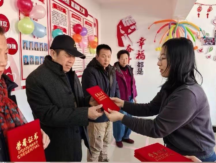 1770181057555730.jpg 彩屯街道關工委照片.jpg